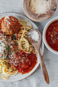handmade pasta and meatballs served family style
